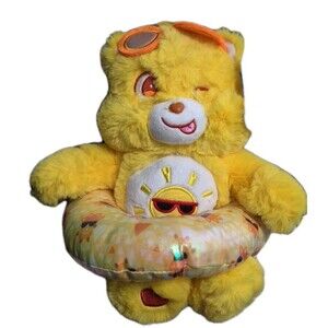 CARE BEARS Funshine Bear Summer Plush Pool Float Yellow Sun NWT